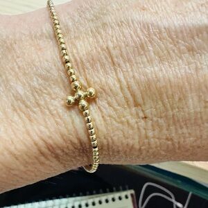 ENewton signature cross gold pattern 2mm beaded bracelet.